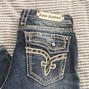 Rock Revival Blue Jeans with Distinctive Stitching